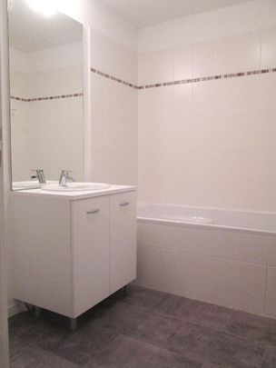 Location Appartement 3 pièces 66m² ST JACQUES DE LA LANDE 35136 - Photo 1
