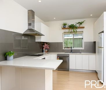 RIVERSIDE LIVING WITH EXPRESS TRAIN SERVICE TO THE AIRPORT & CITY C... - Photo 4