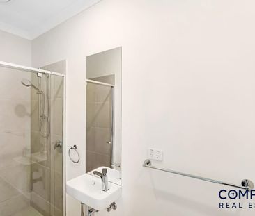 Beautifully Designed Four-Bedroom Home with Modern Comforts - Photo 6