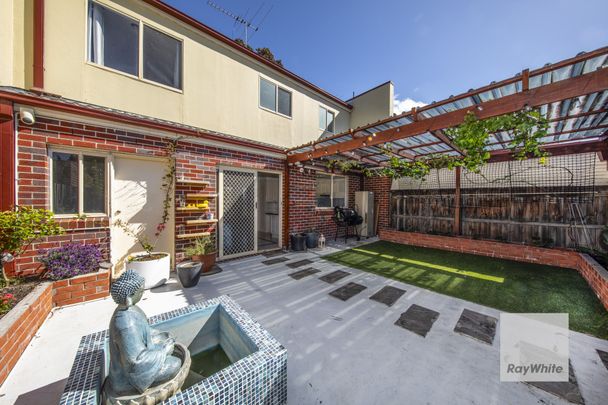 Perfectly Positioned Family Home with Modern Comforts! - Photo 1
