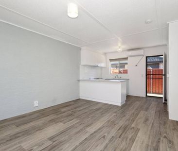 RENOVATED ONE BEDROOM UNIT - Photo 1