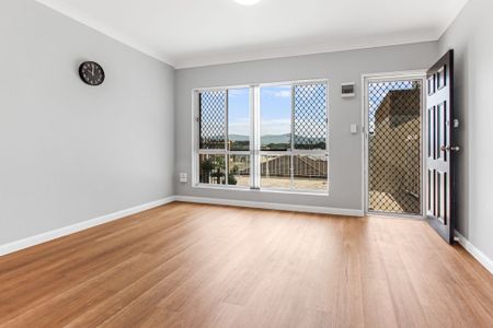 Coastal Convenience - Quiet Top-Floor Living - Photo 2