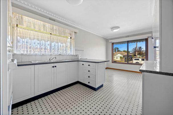 Solid Brick Home with Spacious Garage - Photo 1