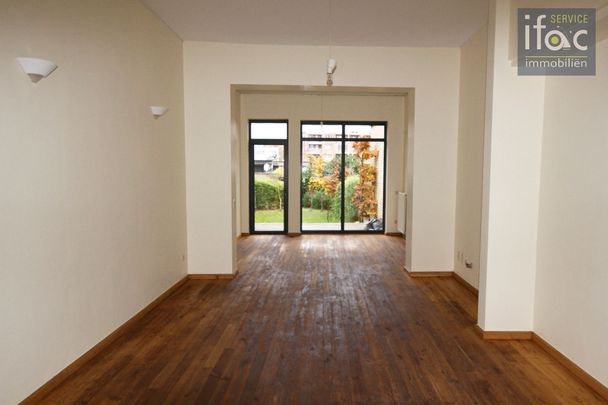 Charmante stadswoning met tuin - Photo 1