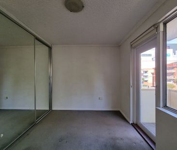 CONVENIENTLY LOCATED 2-BEDROOM UNIT FOR RENT - Photo 2