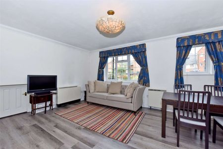 A first floor furnished two bedroom apartment with lift and car parking in a sought after Windsor town development. - Photo 3