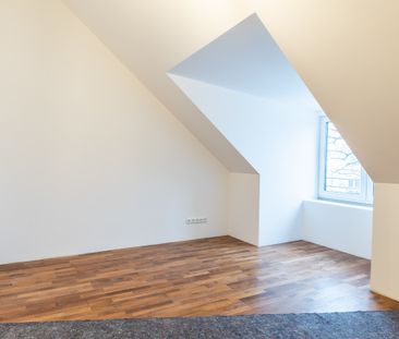 Charmante Maisonettewohnung mit südwestseitigem Balkon - Foto 1