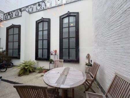 Sfeervol en ruim gelijkvloers 2-slaapkamerappartement met mezzanine - Foto 5