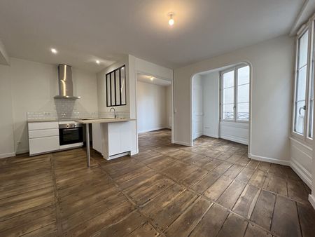 RUE ELIE BERTHET, ENTIEREMENT REFAIT A NEUF T3 de 64m² AVEC BEAUCOUP DE CHARMES ! - Photo 2