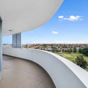 Sun-Drenched Sixth-Floor Living with an Expansive Wraparound Balcony - Photo 2