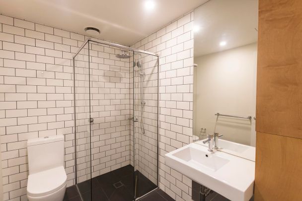 Stunning and Spacious Two-Bedroom Apartment with Large Wrap Around Balcony - Photo 1