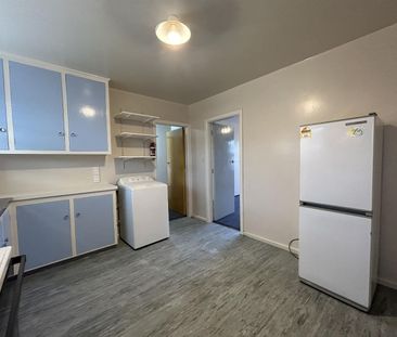 Two Bedroom Unit with Private Garden and Garage! - Photo 1