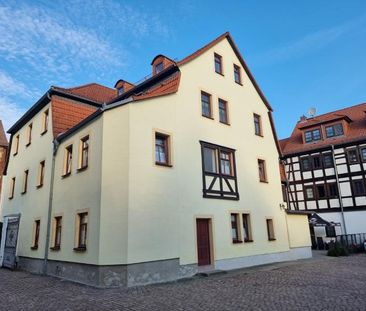 Gemütliche Singlewohnung im Dachgeschoss mit neuer Einbauküche! - Photo 1