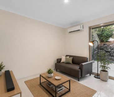 Two-Level Townhouse in an Ultra-Convenient Location - Photo 2