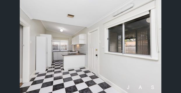 Charming Home in A Desirable Location - Photo 1