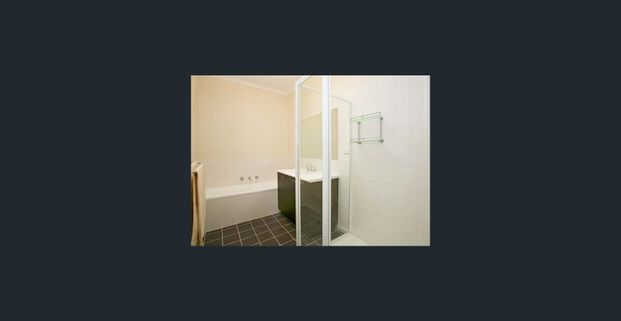 Immaculate Family Living: Streamlined Design in Sought-After Locale! - Photo 1