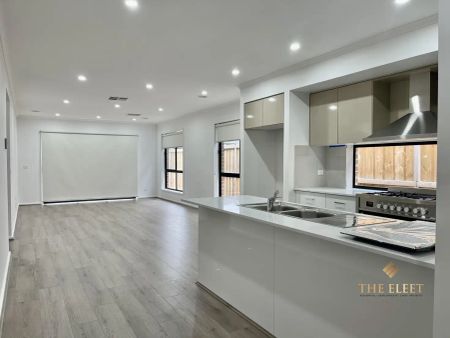 “Stylish 4 bedroom Tarneit home with open-plan living, a modern kitchen, and a spacious master suite.” - Photo 4