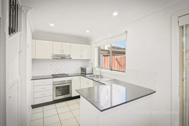“Spacious Home with low maintenance backyard” - Photo 1