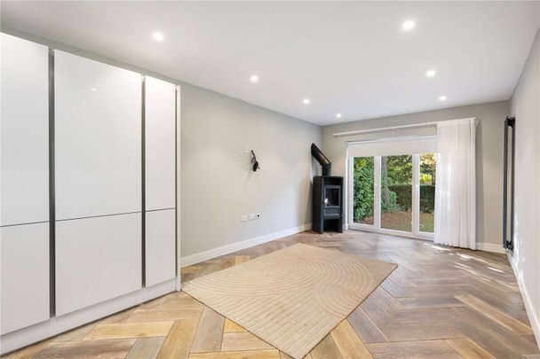 Exceptional contemporary home set within private gardens on one of Wilmslow's most prestigious roads - Photo 1