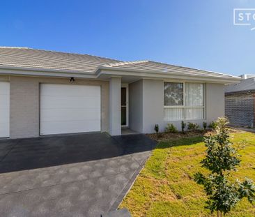 Tidy four bedroom unit - Photo 5