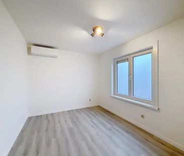 Gerenoveerd 3-slaapkamer appartement met garage in het centrum van ... - Photo 4