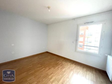 Appartement à louer 4 pièces 78.96m² - Photo 3