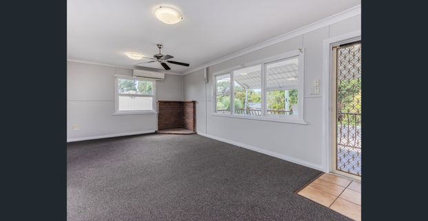 Elevated Family Home with Space, Storage & Street Appeal - Photo 1