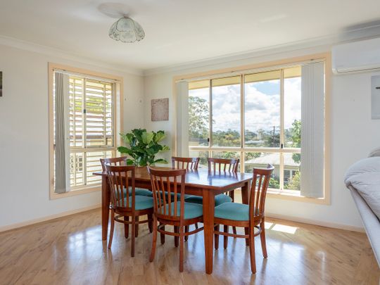 Spacious Family Home with Covered Deck and Convenient Location - Photo 1