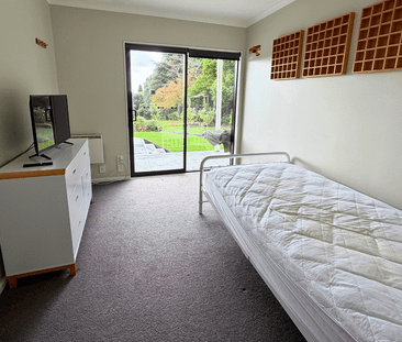 Peaceful Living with Stunning Gardens and Spa Pool - Photo 2