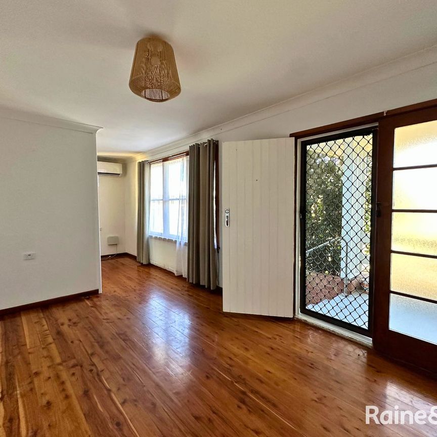 Neat & Tidy Home with Generous Backyard - Photo 1