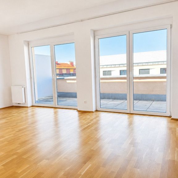 EINMALIGE Penthousewohnung mit 3 Zimmern, 50m2 Dachterrasse und Tiefgarage - Photo 1