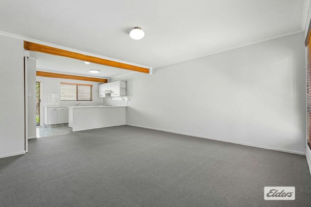 Fresh, Bright & Walk-to-Everything Convenience! - Photo 1