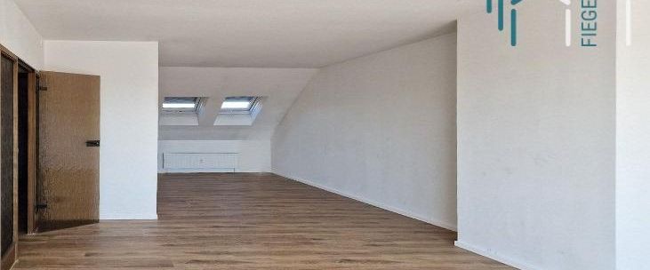 Großzügige, klimatisierte Dachgeschosswohnung mit toller Dachterrasse im Herzen von Heusenstamm - Photo 1