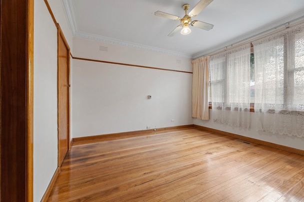 Comfortable 4-Bedroom Home in a Sought-After Location - Photo 1
