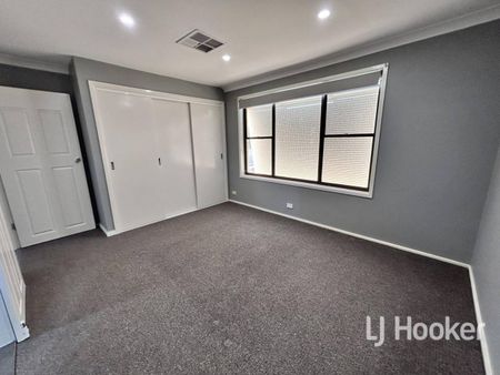 Renovated Family Living with Room to Relax - Photo 2