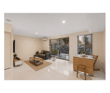 Two-Level Townhouse in an Ultra-Convenient Location - Photo 2