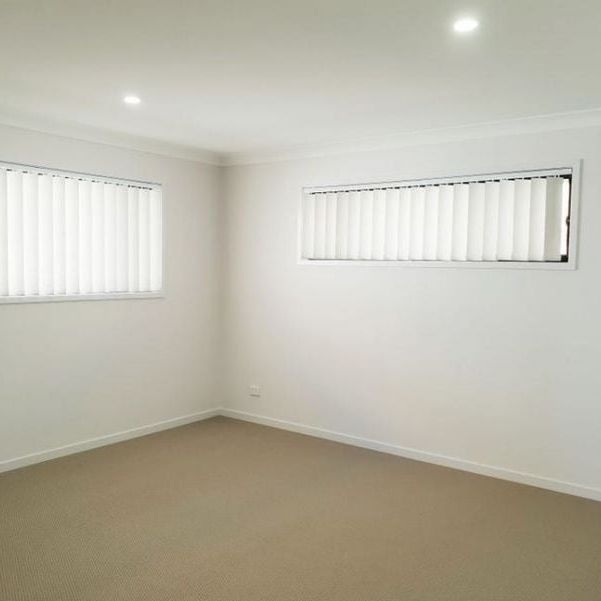 Spacious and modern rental property offers comfortable living in the sought-after Holmview area - Photo 1