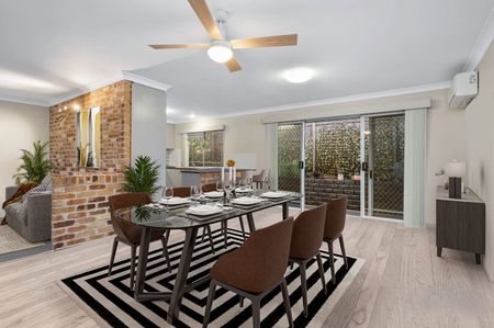 PERFECT FAMILY LIVING WITH CHARACTER BRICK CHARM & SOLAR SAVINGS! - Photo 2