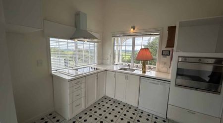 Charming 2-Bedroom Home with Spacious Attic in Waitoki - Photo 2