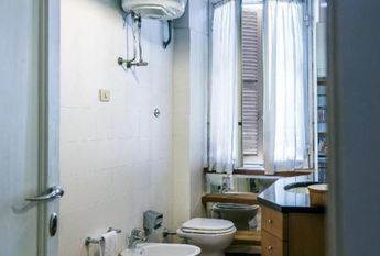 Prati: Spacious, tastefully furnished 1 bedroom, living, study, kitchen and bath. Located in beautiful building on high floor. Bright, silent, near services, metro and center. #1709