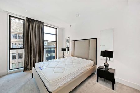 A Lavish 5th floor apartment within a stylish and highly desirable boutique new development. Beautiful open plan reception, large double bedroom and a contemporary bathroom. - Photo 3