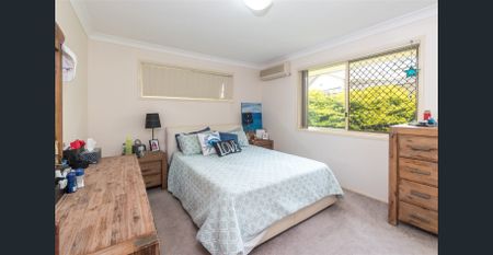 Spacious Family Home with Multiple Living Spaces - Photo 3