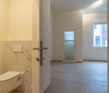 Stadswoning met 3 slpk's, tuin en dubbele garage te Turnhout - Photo 6