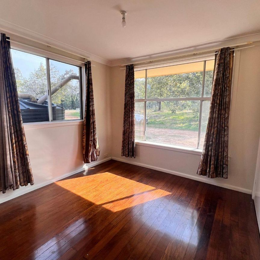 Neat 3-bedroom Home Overlooking Farmland - Photo 1