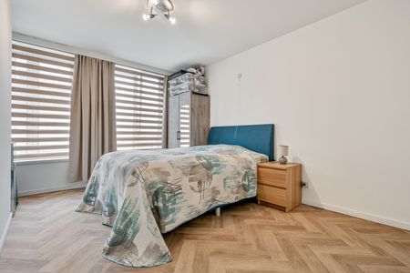 Gelijkvloers appartement met zonnig terras en aparte garage! - Foto 3