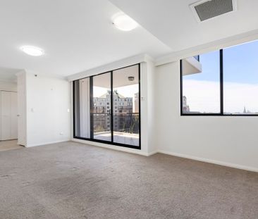 One Bedroom Apartment Flooded with Natural Light - Photo 6