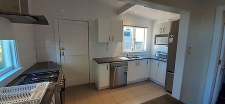 Spacious Five-Bedroom Home in the Heart of Newtown - Photo 4