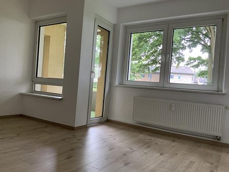 Diese Wohnung befindet sich in einem besonders grünen Wohnumfeld! - Photo 2