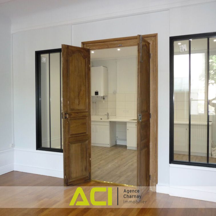 MACON CENTRE TRES BEL APPARTEMENT RENOVE AVEC COUR INTERIEURE - Photo 1