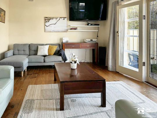 Central Living with Comfort and Space - Photo 1
